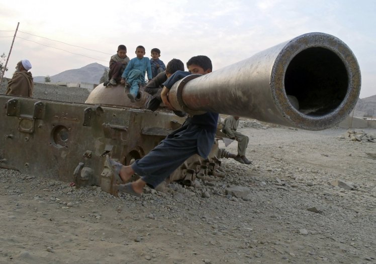 afghan children soviet tank.jpg